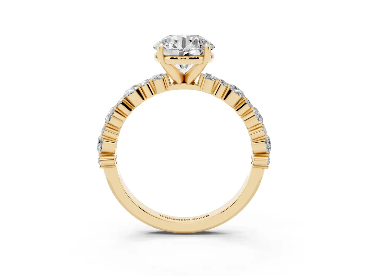 Round Cut Diamond Side Stone Solitaire Ring with Round and Four-Prong Setting Yellow gold