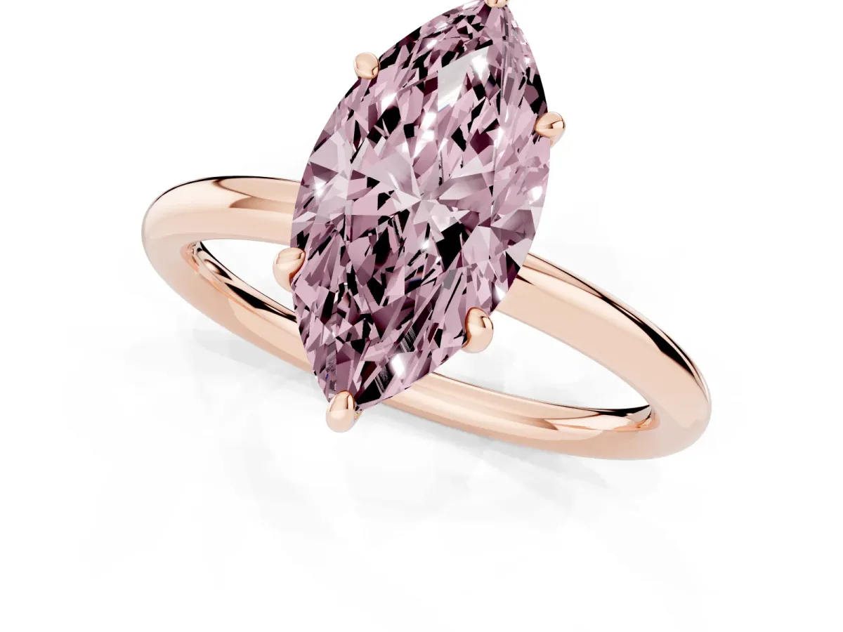 Fancy Pink Oval Cut Solitaire Diamond Ring with Four-Prong Setting on a Plain Band Rose gold