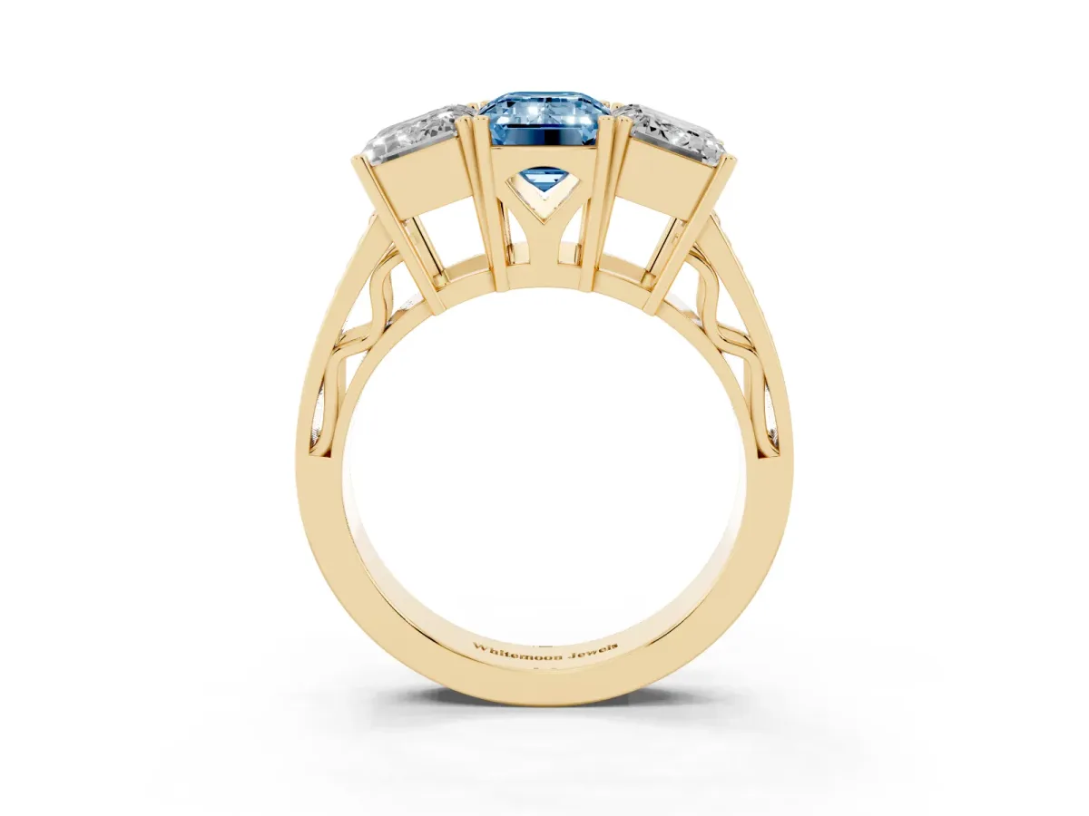 Fancy Blue Emerald Cut Diamond Three-Stone Ring with Prong Setting and Textured Band Yellow gold