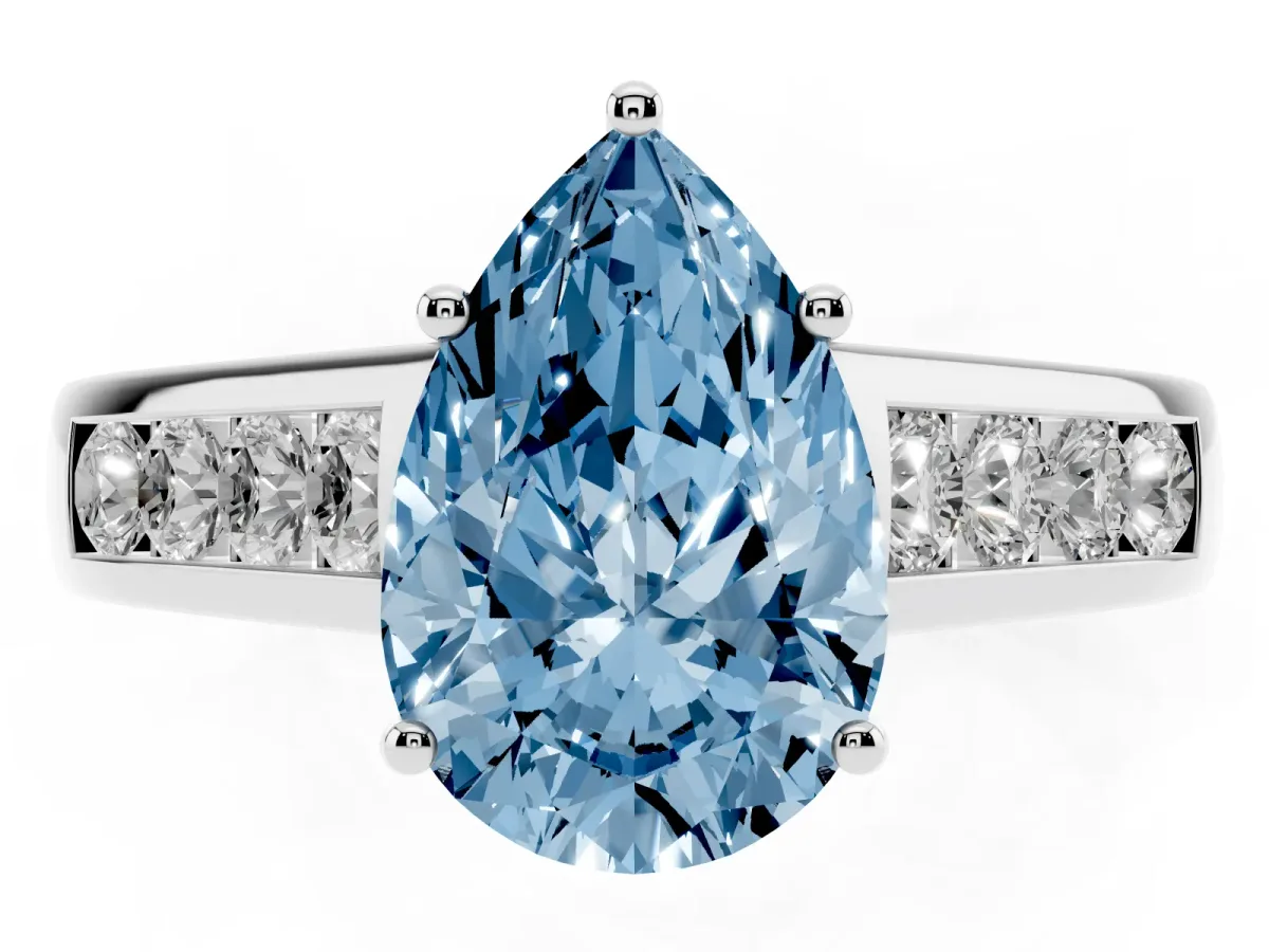 Fancy Blue Pear Cut Brilliant Channel-Set Solitaire Ring with Four-Prong Setting Silver