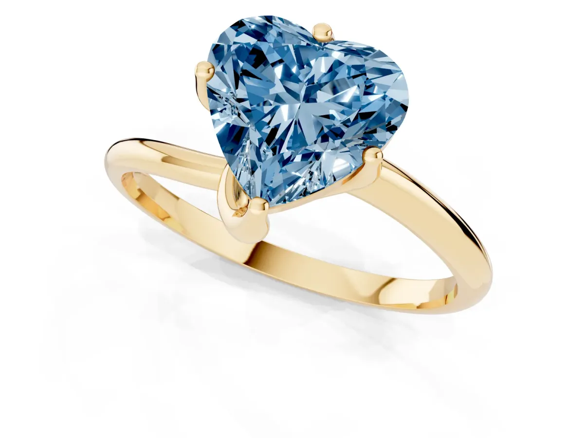 Fancy Blue Heart Cut Diamond Solitaire Engagement Ring with Four-Prong Setting and Classic Band Yellow gold