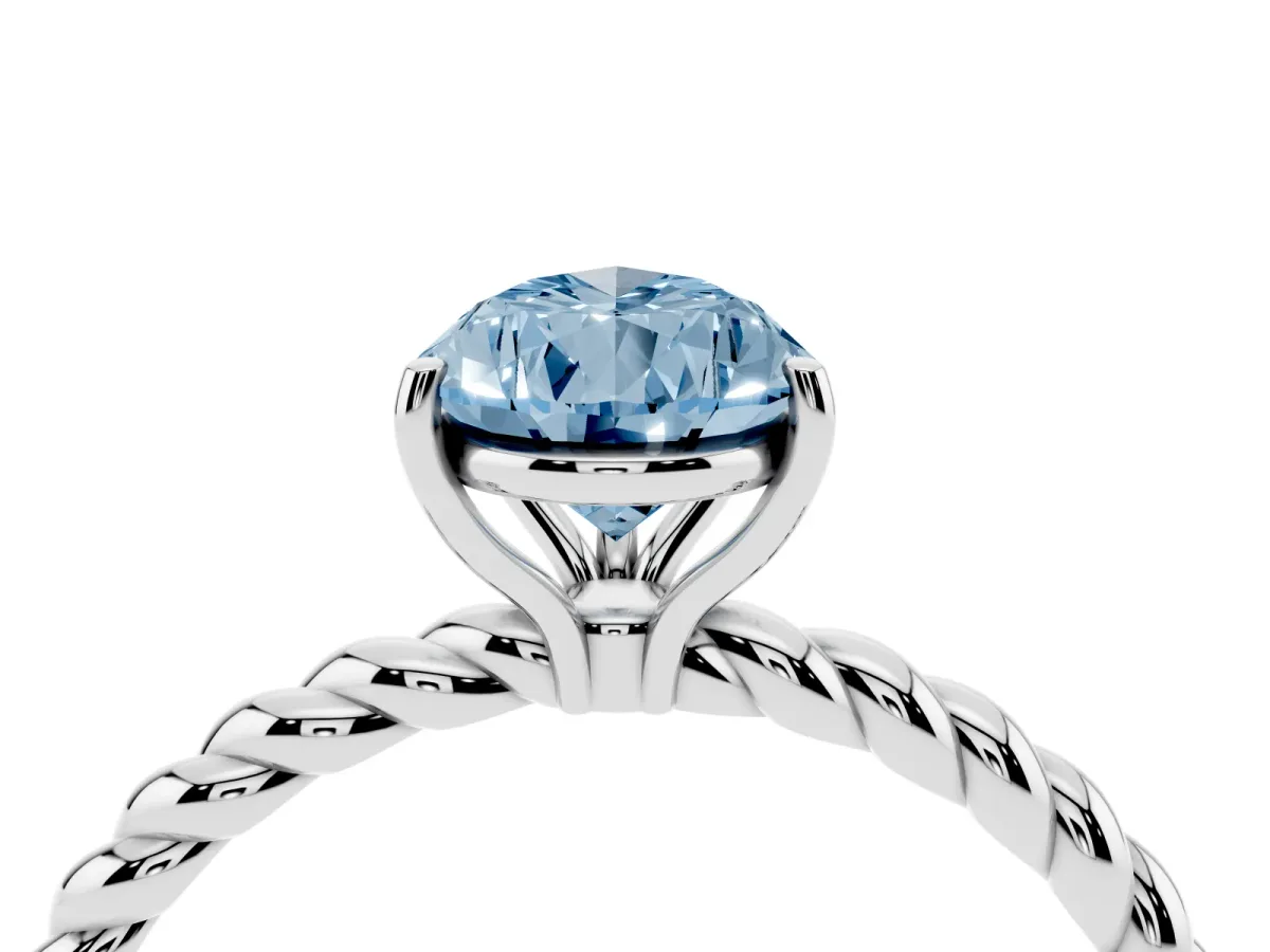 Fancy Blue Pear Cut Solitaire Twist Band Ring with Four-Prong Setting Silver