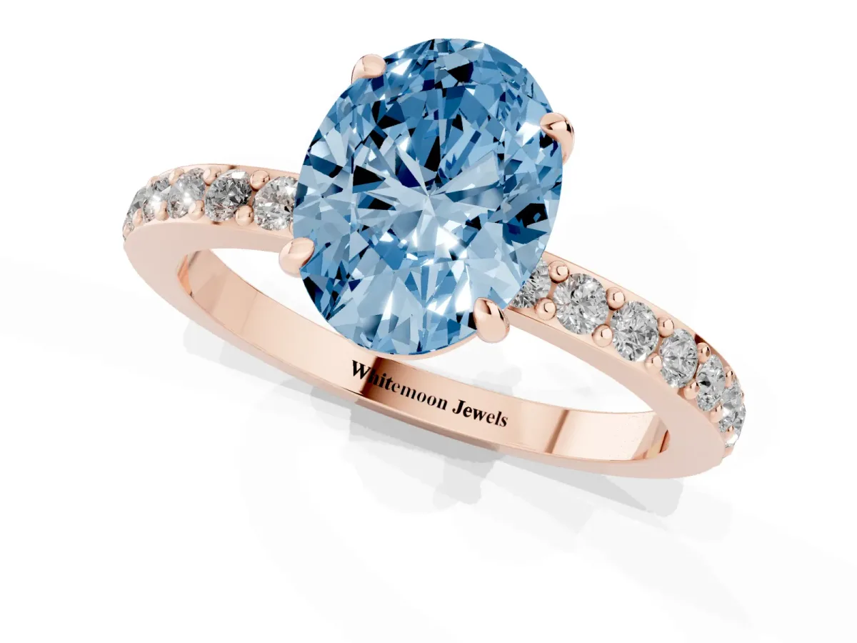 Fancy Blue Oval Cut Diamond Pavé Engagement Ring with Round Accents and Prong Setting Rose gold