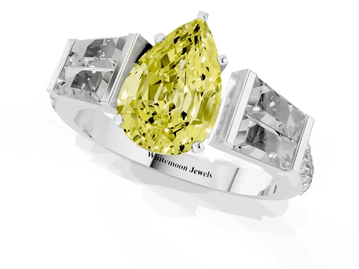 Fancy Yellow Pear Cut Diamond Engagement Ring with Baguette Side Stones and Channel Set Band White gold