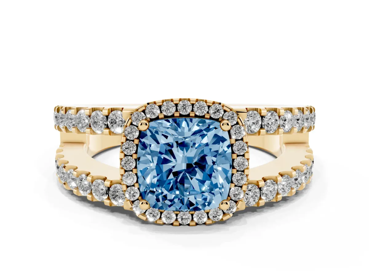 Fancy Blue Cushion Cut Cut Halo Split Shank Diamond Ring with Four-Prong Setting Yellow gold