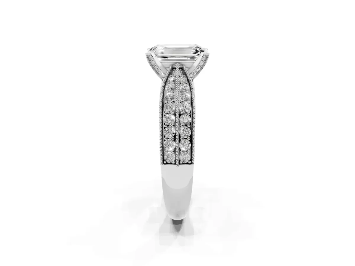 Emerald Cut Diamond Solitaire Ring with Milgrain Round Pavé Band and Prong Setting Platinum