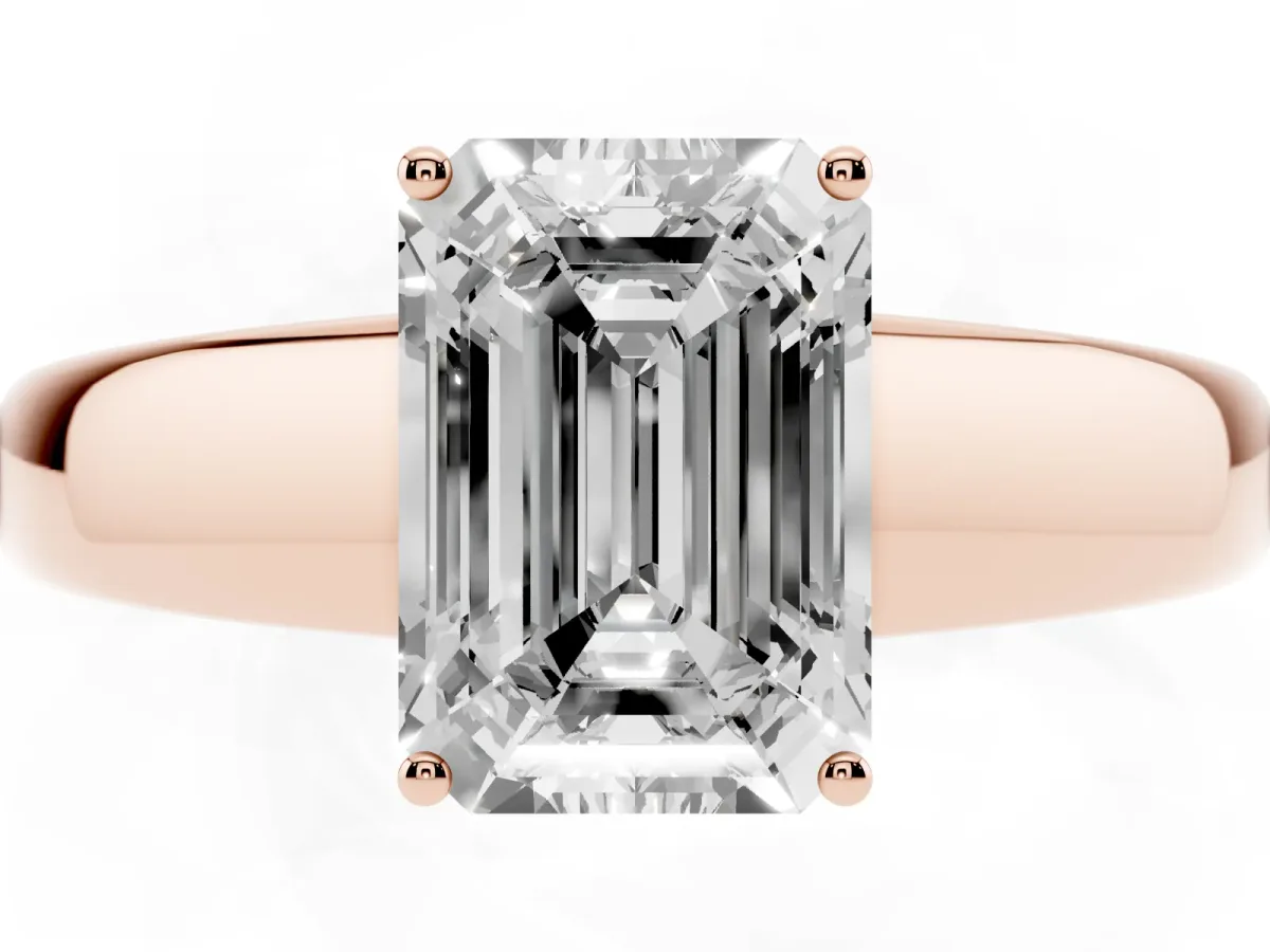 Emerald Cut Solitaire Diamond Ring with Tapered Band and Four-Prong Setting Rose gold
