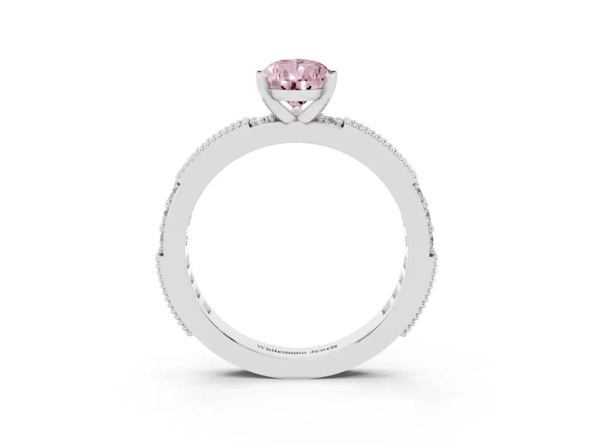 Fancy Pink Pear Cut Solitaire with Pavé Band and Four-Prong Setting Platinum
