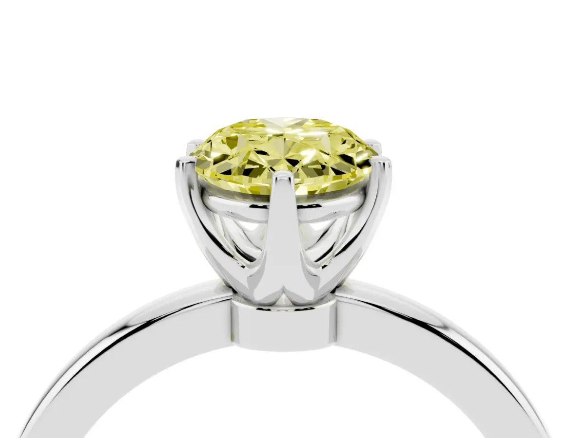Fancy Yellow Oval Cut Solitaire Diamond Ring with Six-Prong Setting on a Classic Band Silver