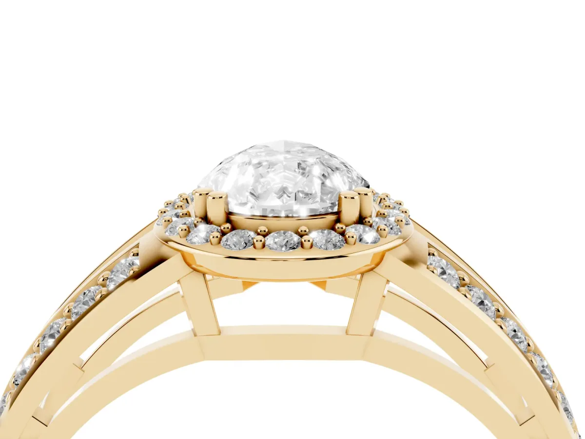 Pear Cut Diamond Halo Ring with Split Shank Pavé Band and Four-Prong Setting Yellow gold