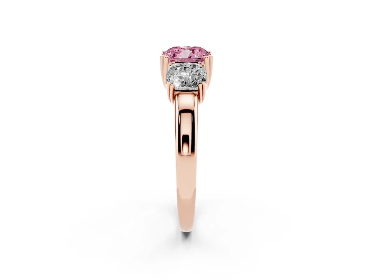 Fancy Pink Three-Stone Cushion Cut Cut Diamond Ring with Channel Set Band and Four-Prong Setting Rose gold