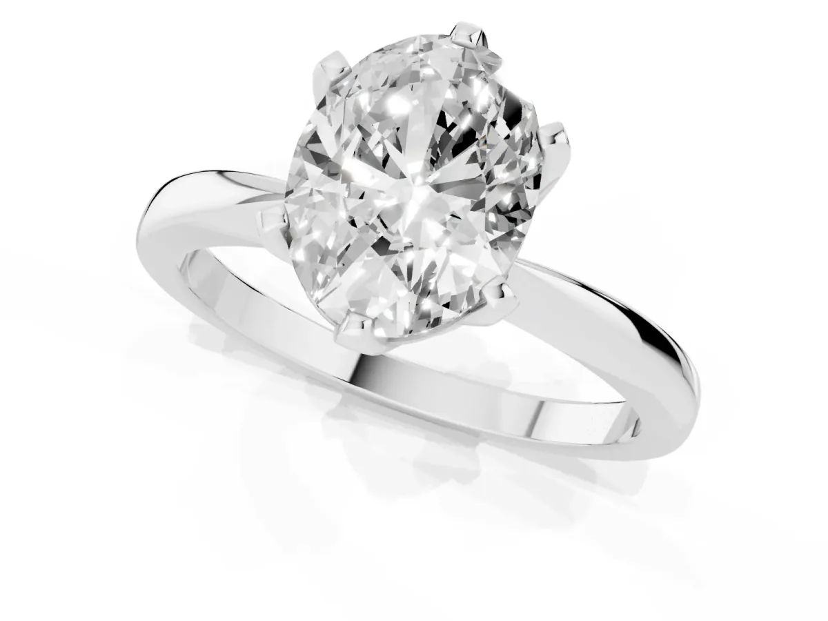 Oval Cut Solitaire Engagement Ring with Six-Prong Setting and Tapered Band Platinum