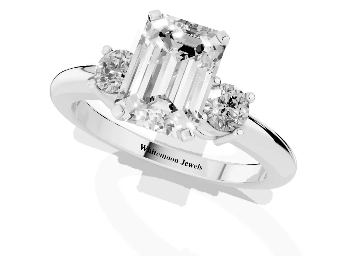 Three-Stone Emerald Cut Cut Diamond Solitaire with Prong Setting and Classic Band Silver