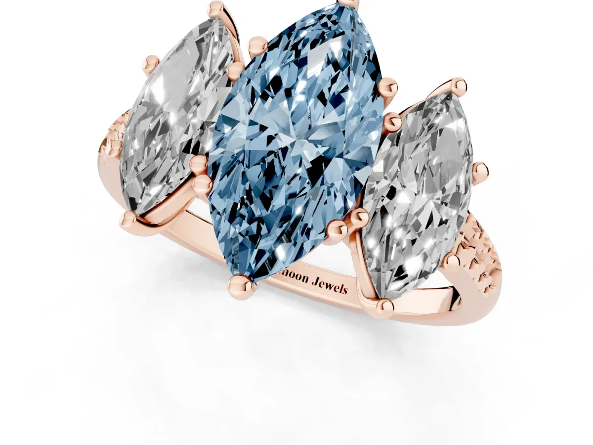 Fancy Blue Three-Stone Marquise Cut Diamond Ring with Round Pavé Band and Prong Setting Rose gold