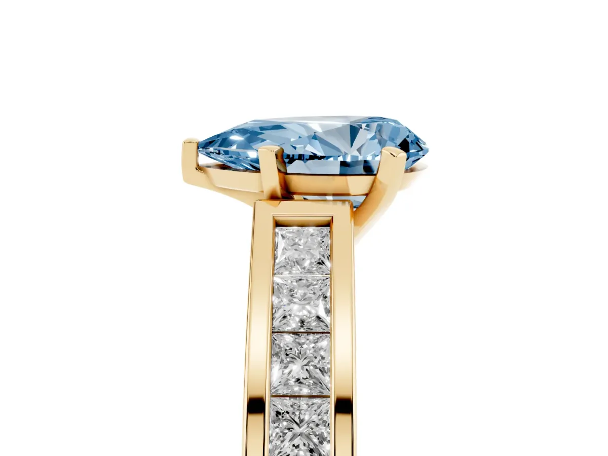 Fancy Blue Pear Cut Solitaire Diamond Ring with Channel-Set Band and Four-Prong Setting Yellow gold