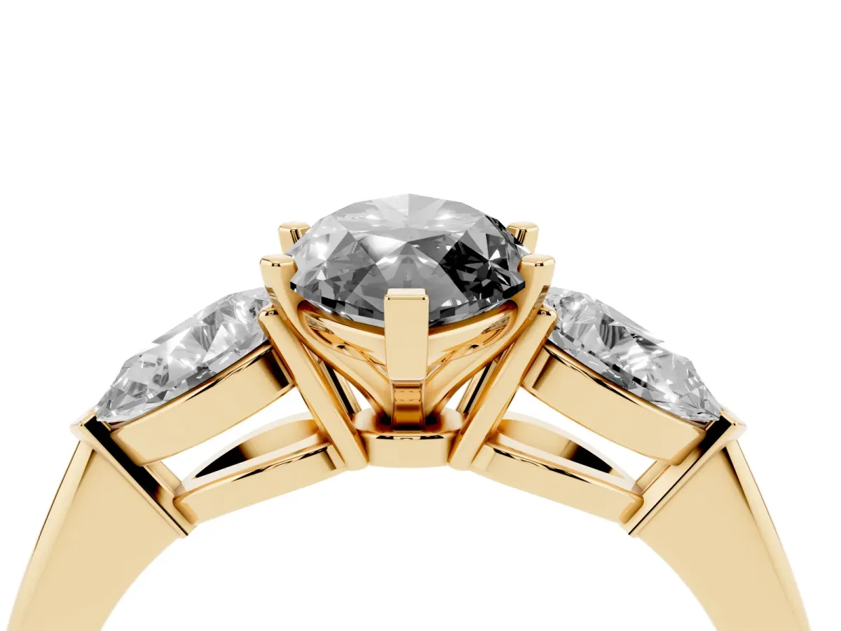 Fancy Black Three-Stone Marquise Cut Diamond Ring with Pear Side Stones and Four-Prong Setting Yellow gold
