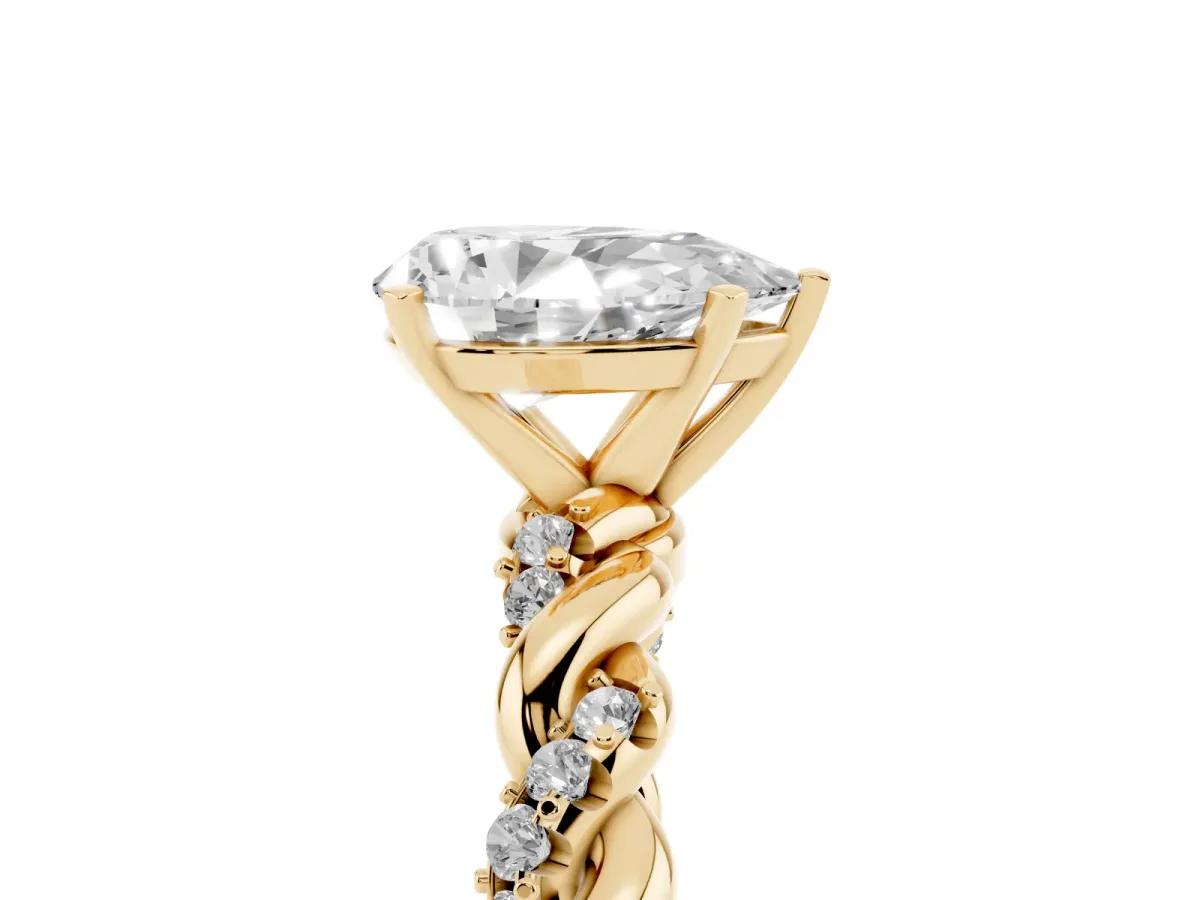 Pear Cut Diamond Solitaire Ring with Twisted Band and Pavé Accents Yellow gold