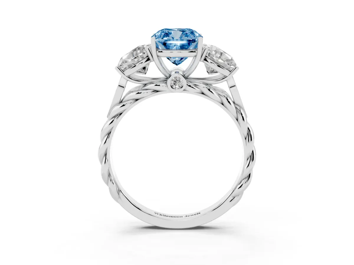 Fancy Blue Three-Stone Cushion Cut Diamond Braided Band Ring with Four-Prong Setting Platinum