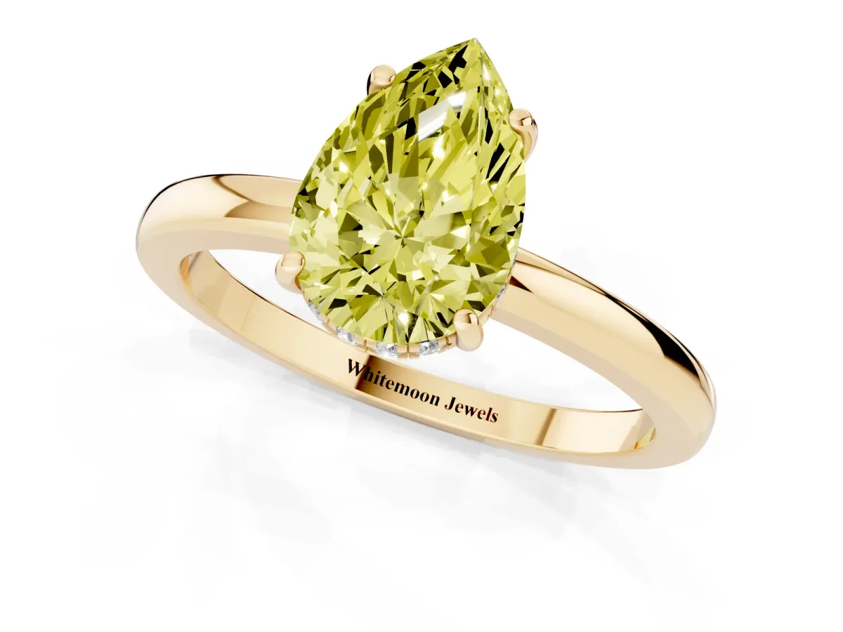 Fancy Yellow Pear Cut Solitaire Diamond Ring with Prong Setting and Plain Band Yellow gold