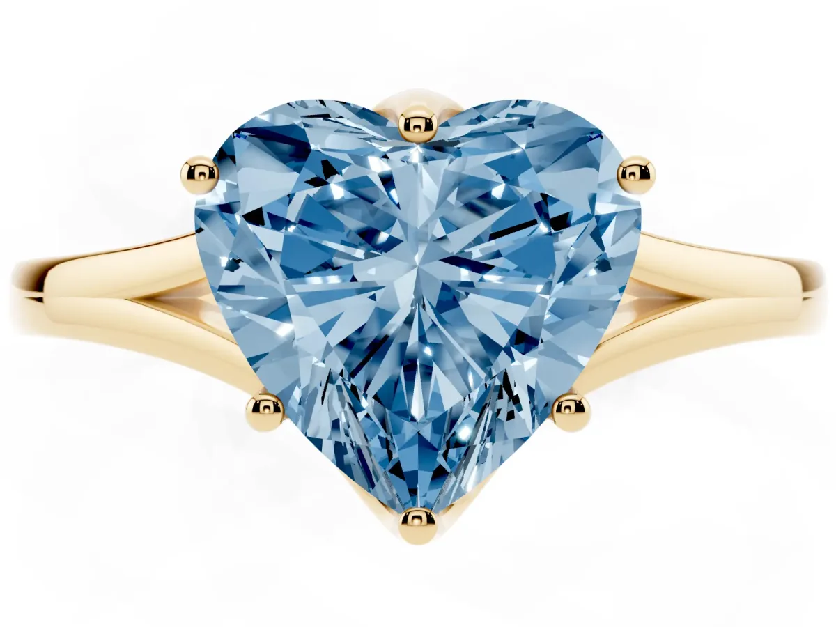 Fancy Blue Heart Cut Solitaire Diamond Ring with Six-Prong Setting and Tapered Band Yellow gold