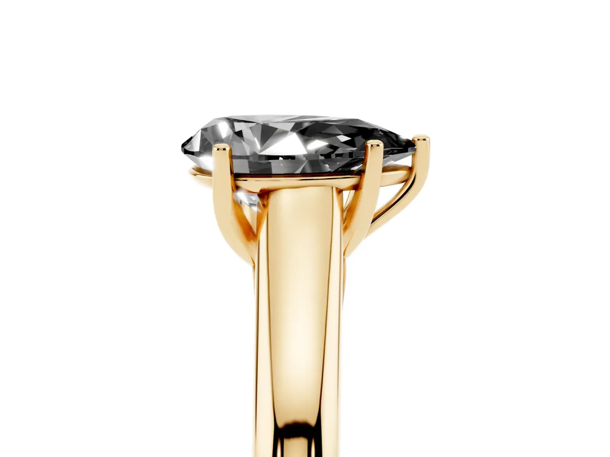 Fancy Black Pear Cut Solitaire Engagement Ring with Tapered Band and Four-Prong Setting Yellow gold