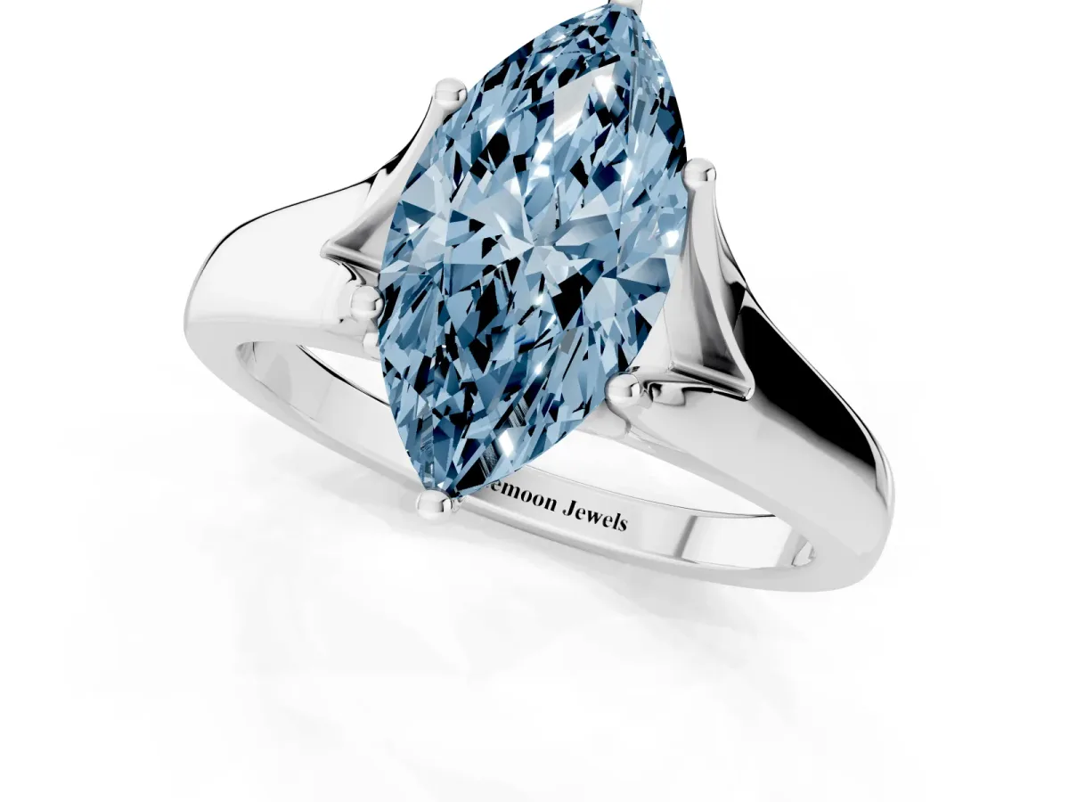 Fancy Blue Marquise Cut Solitaire Diamond Ring with Cathedral Band and Four-Prong Setting Platinum