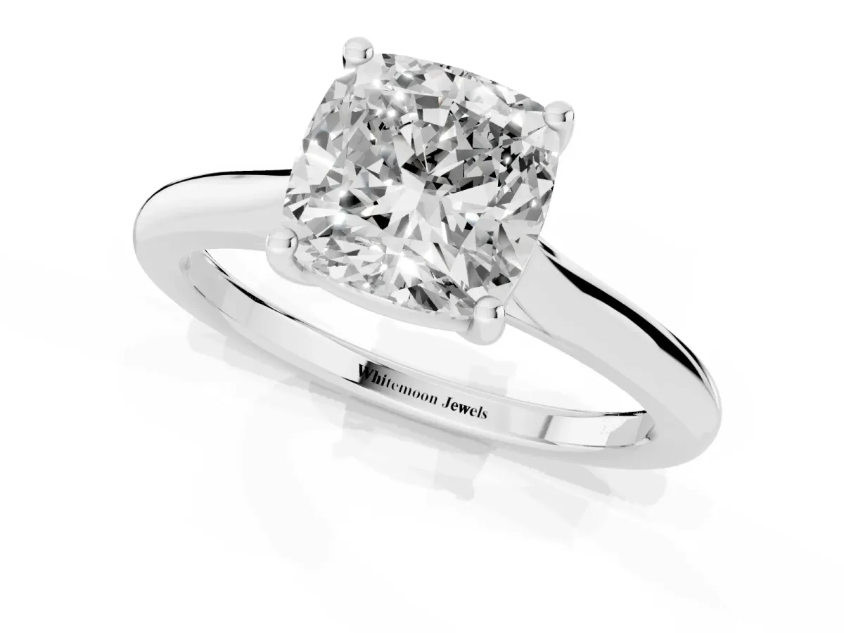 Cushion Cut Cut Solitaire Ring with Cathedral Band and Four-Prong Setting Silver