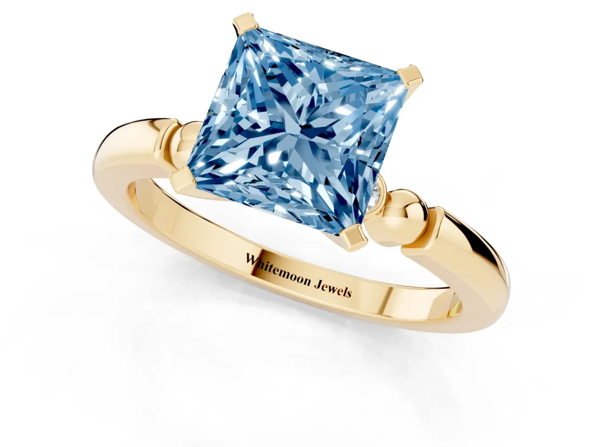 Fancy Blue Princess Cut Solitaire Beaded Band with Four-Prong Setting Yellow gold