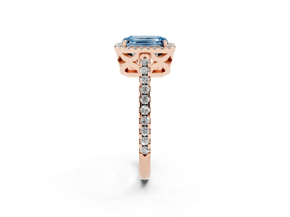 Fancy Blue Emerald Cut Diamond Halo Engagement Ring with Pavé Band and Prong Setting Rose gold