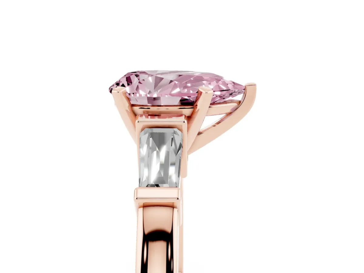 Fancy Pink Pear Cut Cut Diamond Solitaire Ring with Tapered Baguette Accents and Four-Prong Setting Rose gold