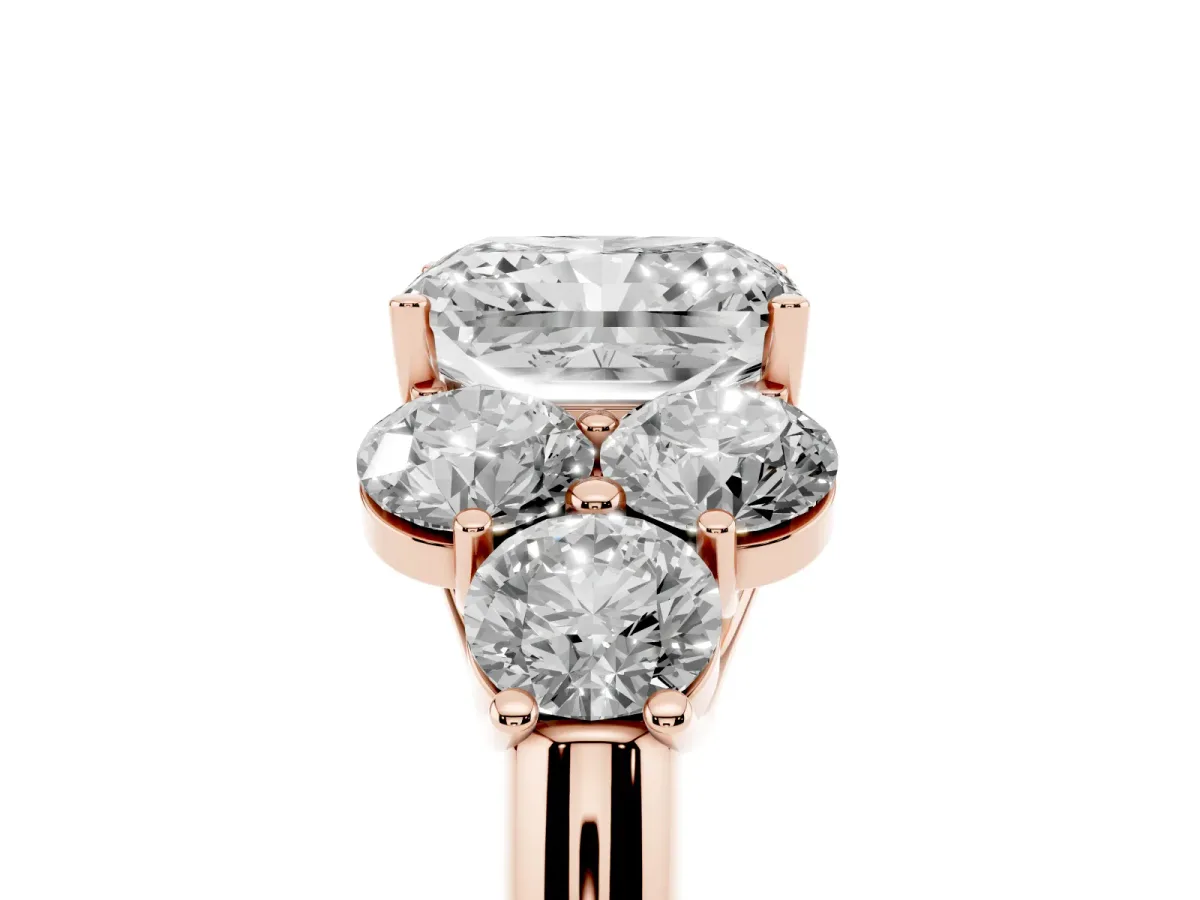Radiant Cut Cut Diamond Cluster Ring with Round Accent Stones and Prong Setting on a Classic Band Rose gold