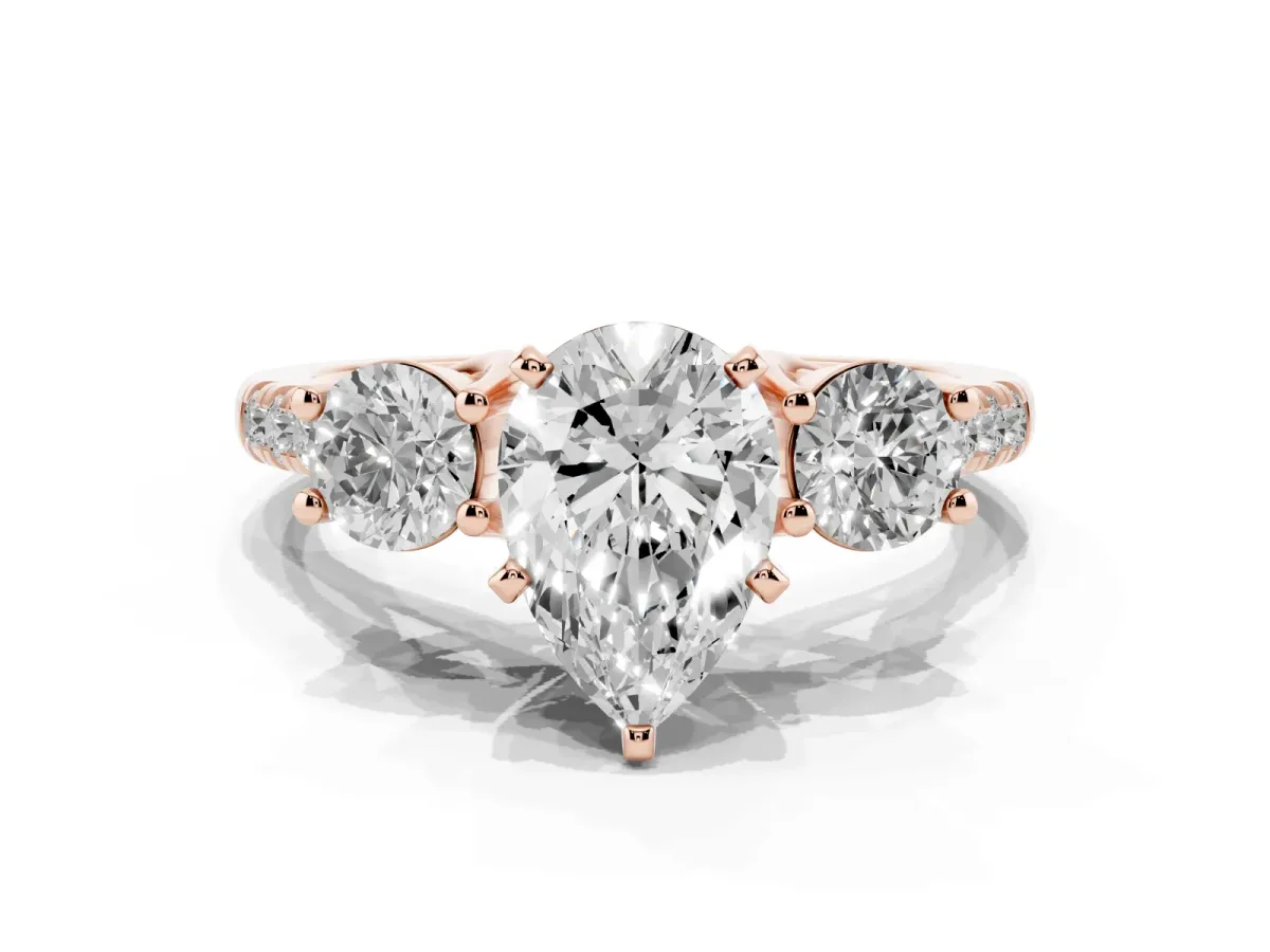 Three-Stone Pear Cut Diamond Pavé Band with Four-Prong Setting Rose gold