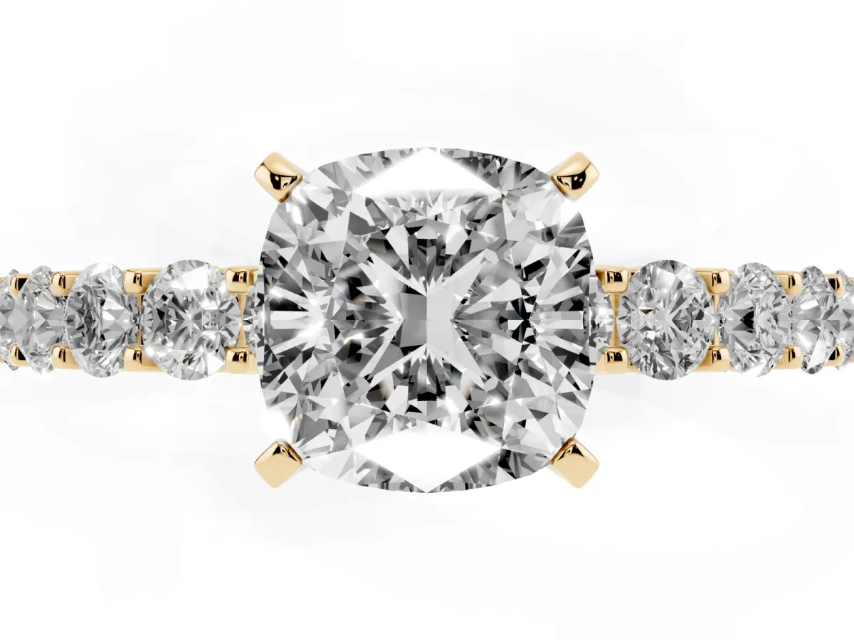 Cushion Cut Diamond Solitaire Ring with Shared Prong Pavé Band and Four-Prong Setting Yellow gold