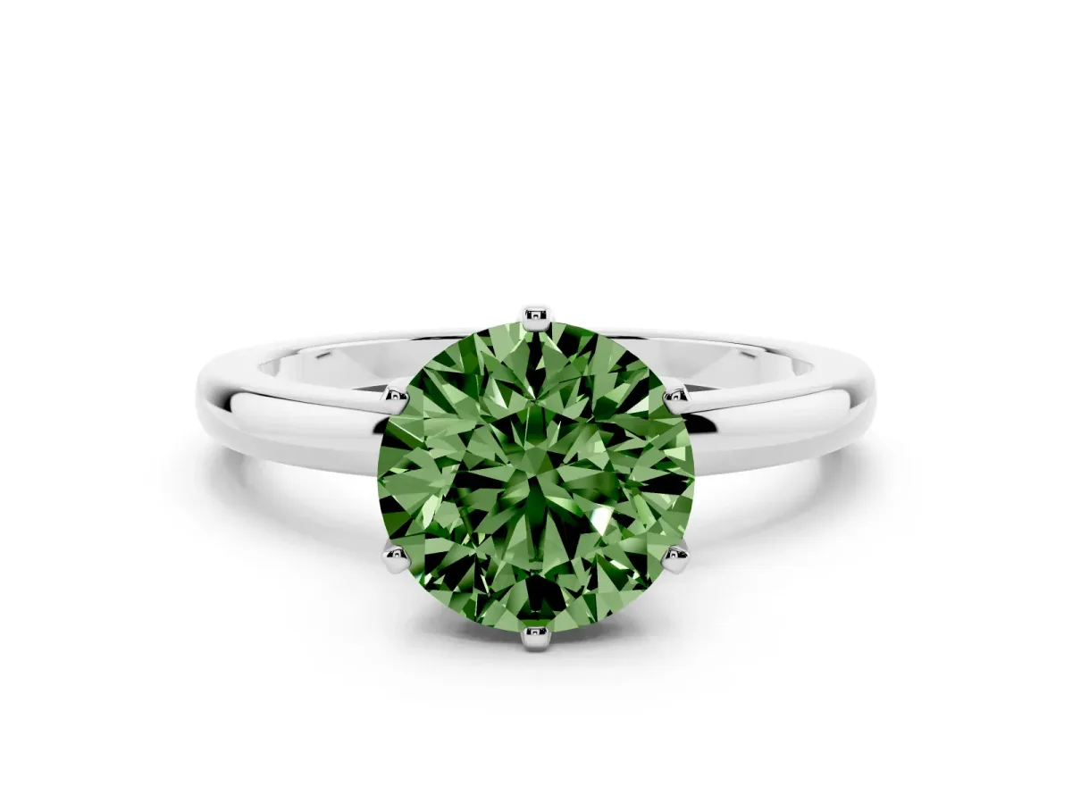 Fancy Green Round Cut Solitaire Diamond Ring with Six-Prong Setting on a Classic Band Silver