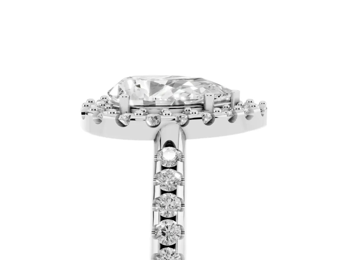 Pear Cut Diamond Pavé Halo Ring with Four-Prong Setting Platinum