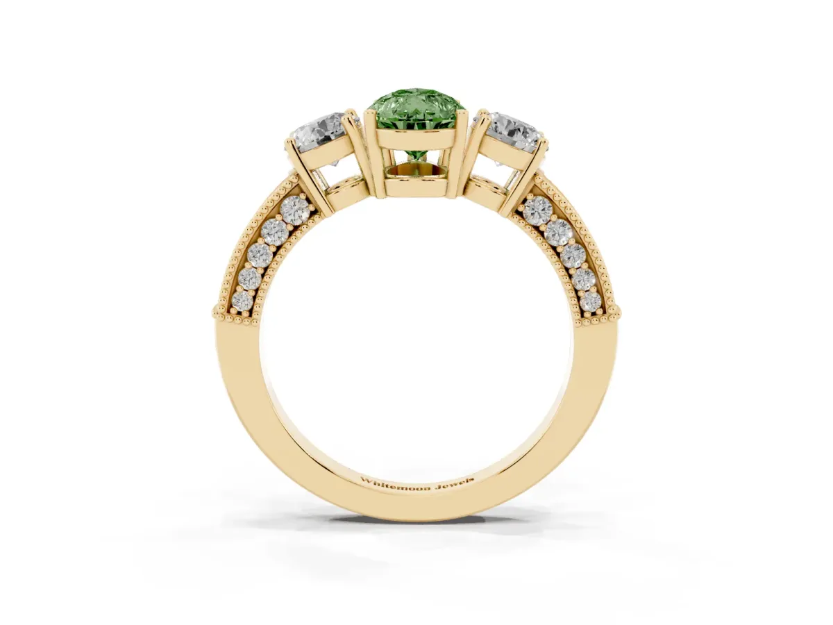Fancy Green Pear Cut Three-Stone Diamond Ring with Pavé Band and Four-Prong Setting Yellow gold
