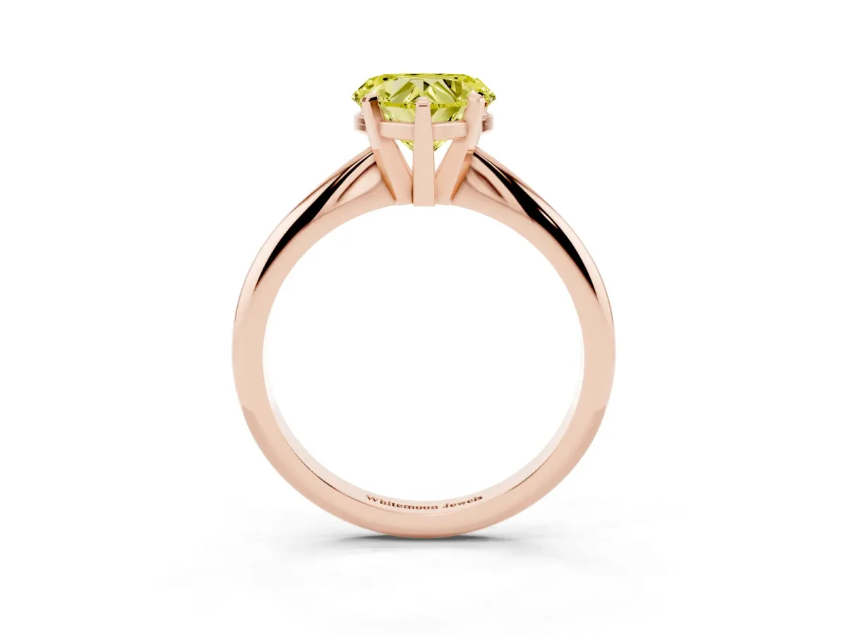 Fancy Yellow Heart Cut Cut Solitaire Ring with Four-Prong Setting on a Classic Band Rose gold