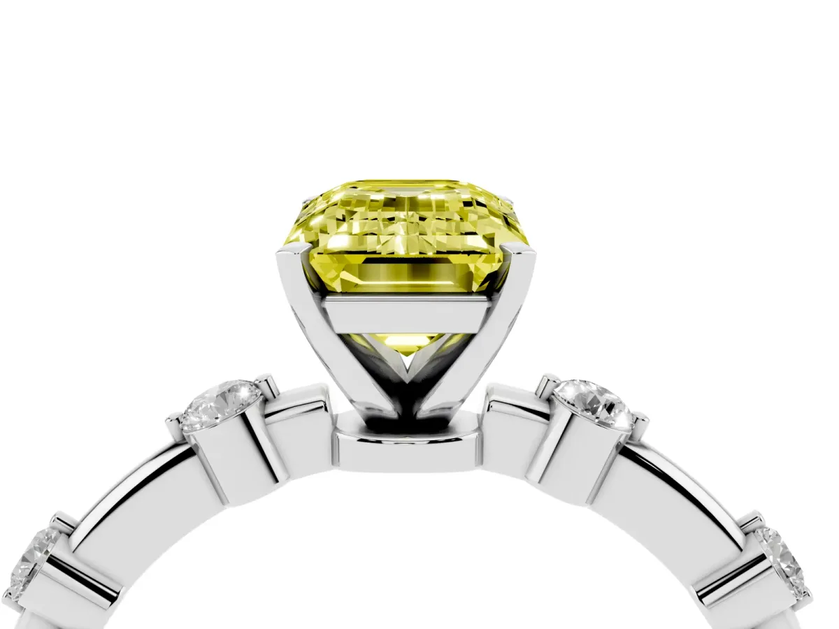 Fancy Yellow Emerald Cut Solitaire Diamond Ring with Bezel Set Side Stones and Prong Setting Silver