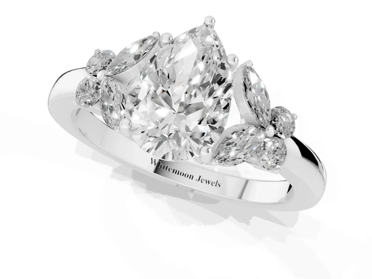 Pear Cut Cut Solitaire Floral Diamond Ring with Four-Prong Setting Platinum