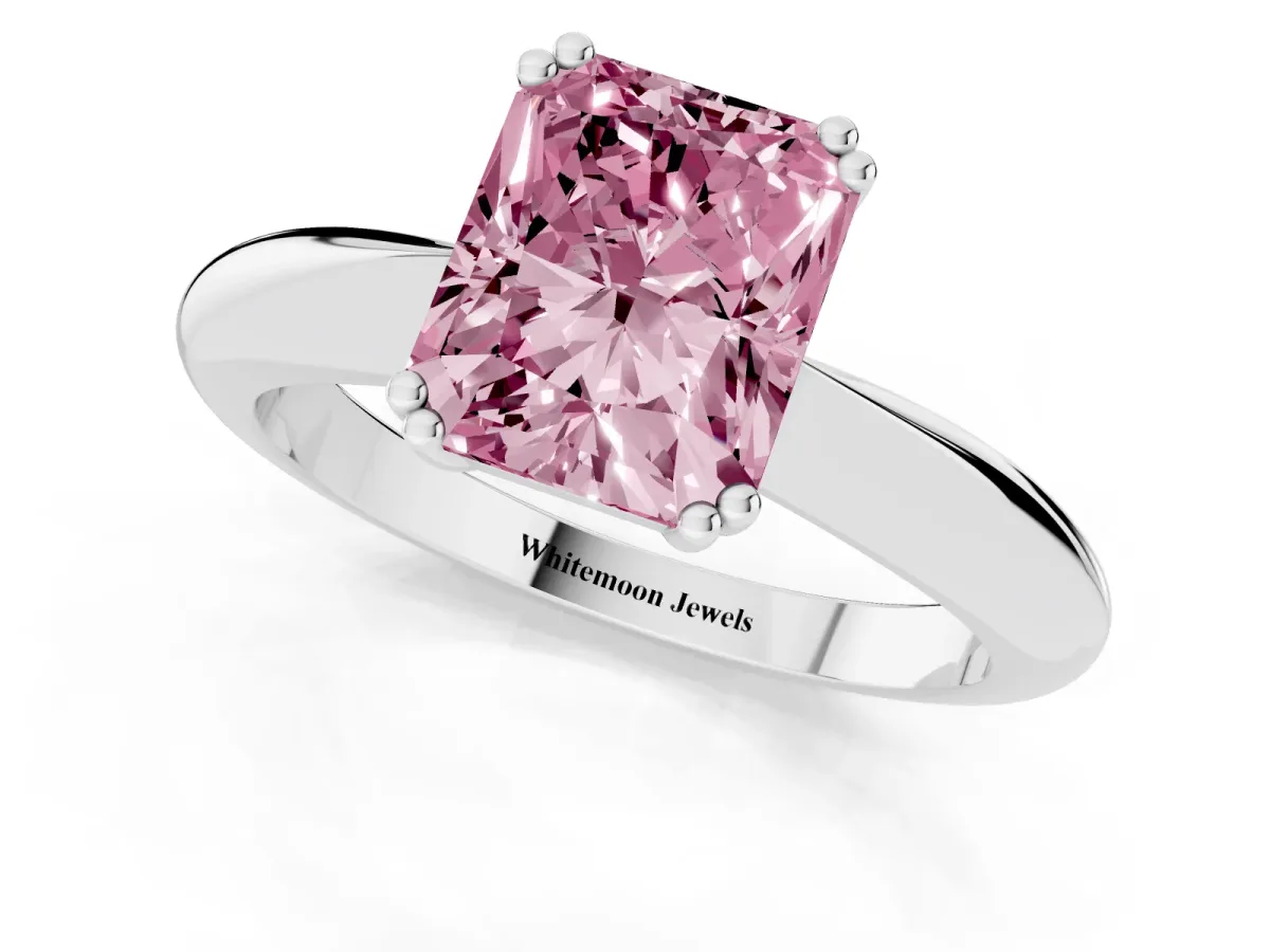 Fancy Pink Radiant Cut Cut Solitaire Engagement Ring with Tapered Band and Four-Prong Setting Platinum