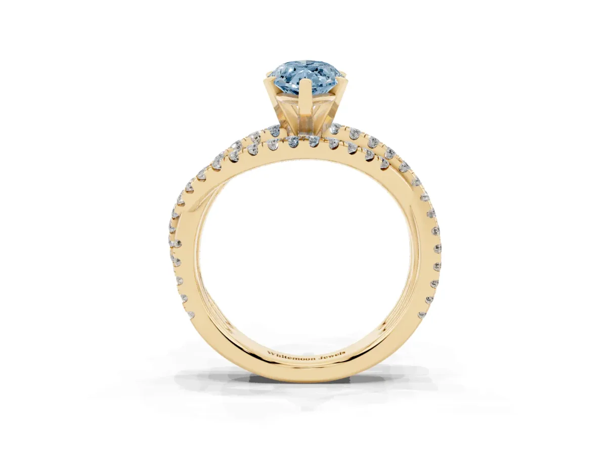 Fancy Blue Marquise Cut Solitaire Twist Band with Pavé Setting and Four-Prong Setting Yellow gold