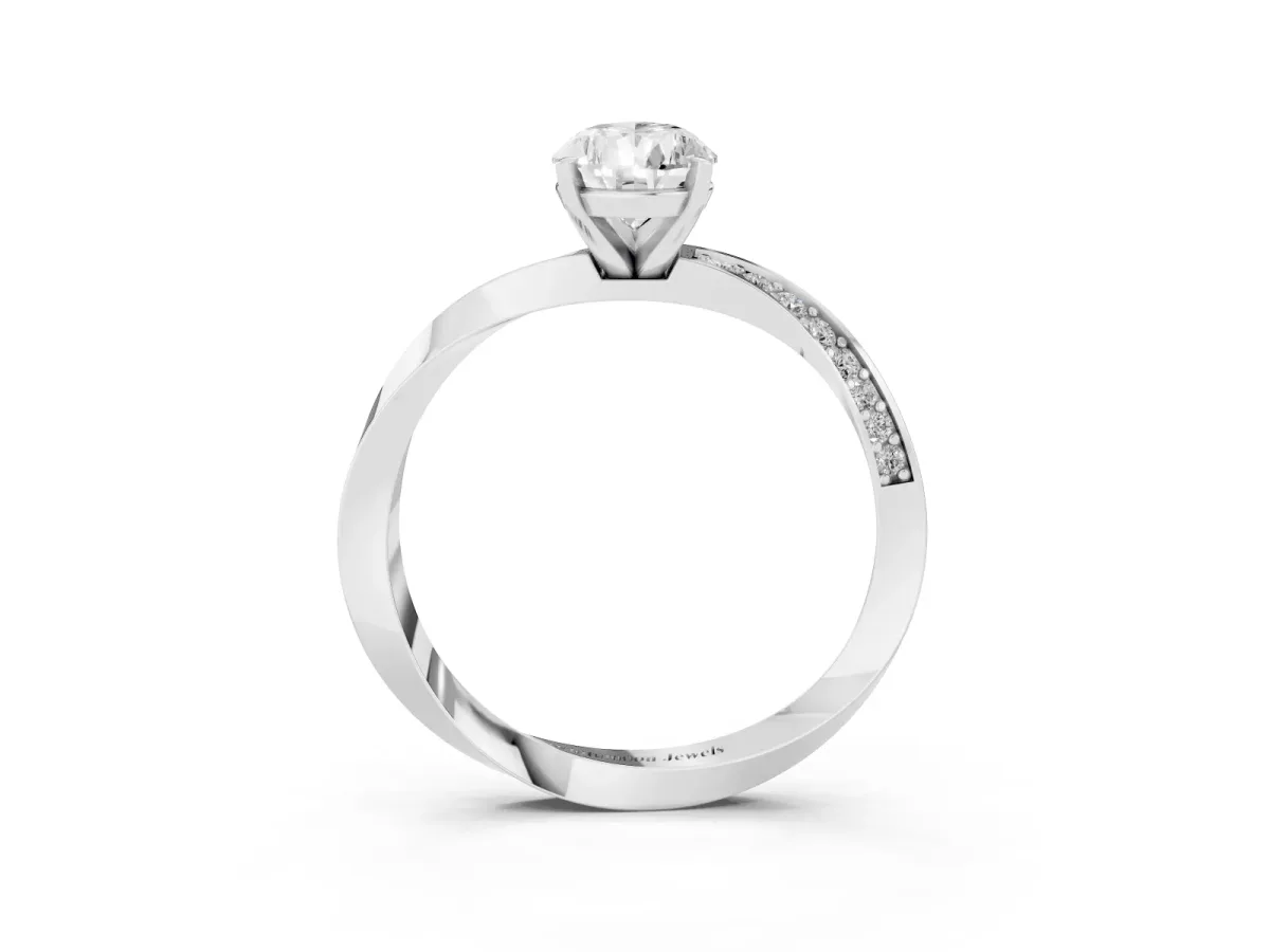 Pear Cut Diamond Engagement Ring with Side Stone Accents and Four-Prong Setting Silver