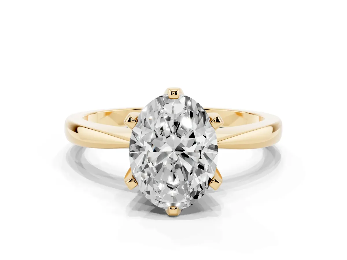 Oval Cut Solitaire Engagement Ring with Six-Prong Setting and Tapered Band Yellow gold