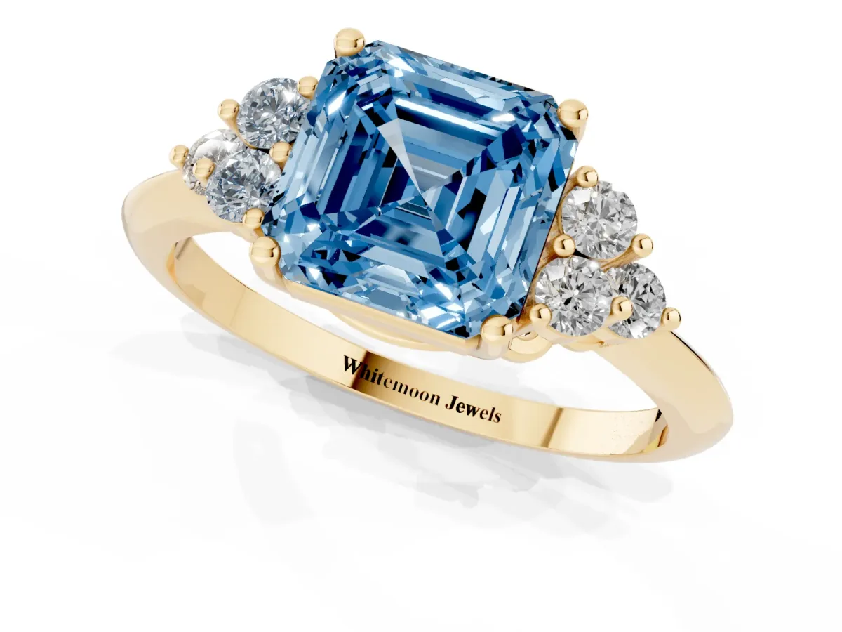 Fancy Blue Asscher Cut Cut Diamond Cluster Ring with Solitaire Band and Four-Prong Setting Yellow gold