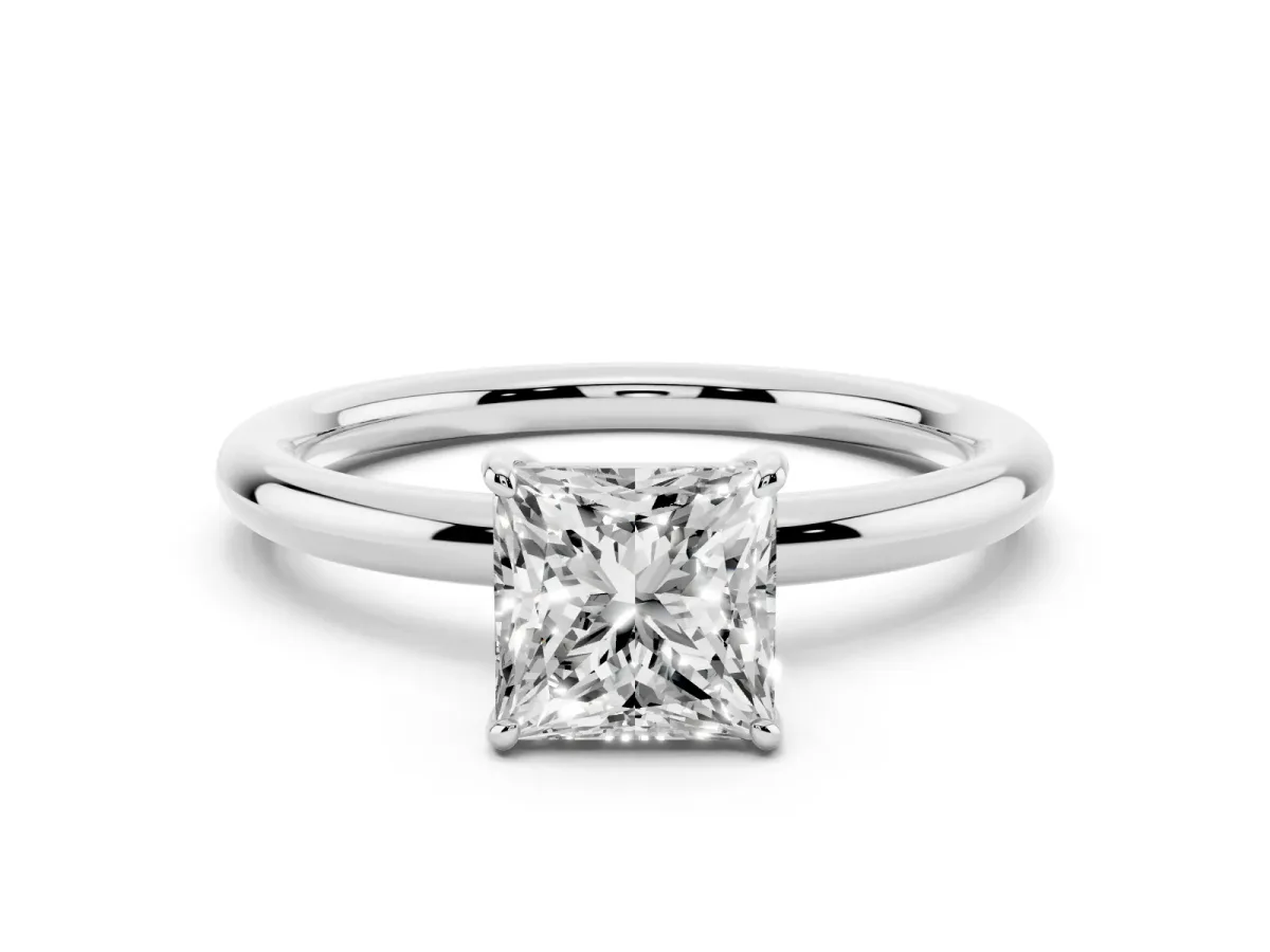 Princess Cut Solitaire Diamond Ring with Four-Prong Setting on a Plain Band Platinum