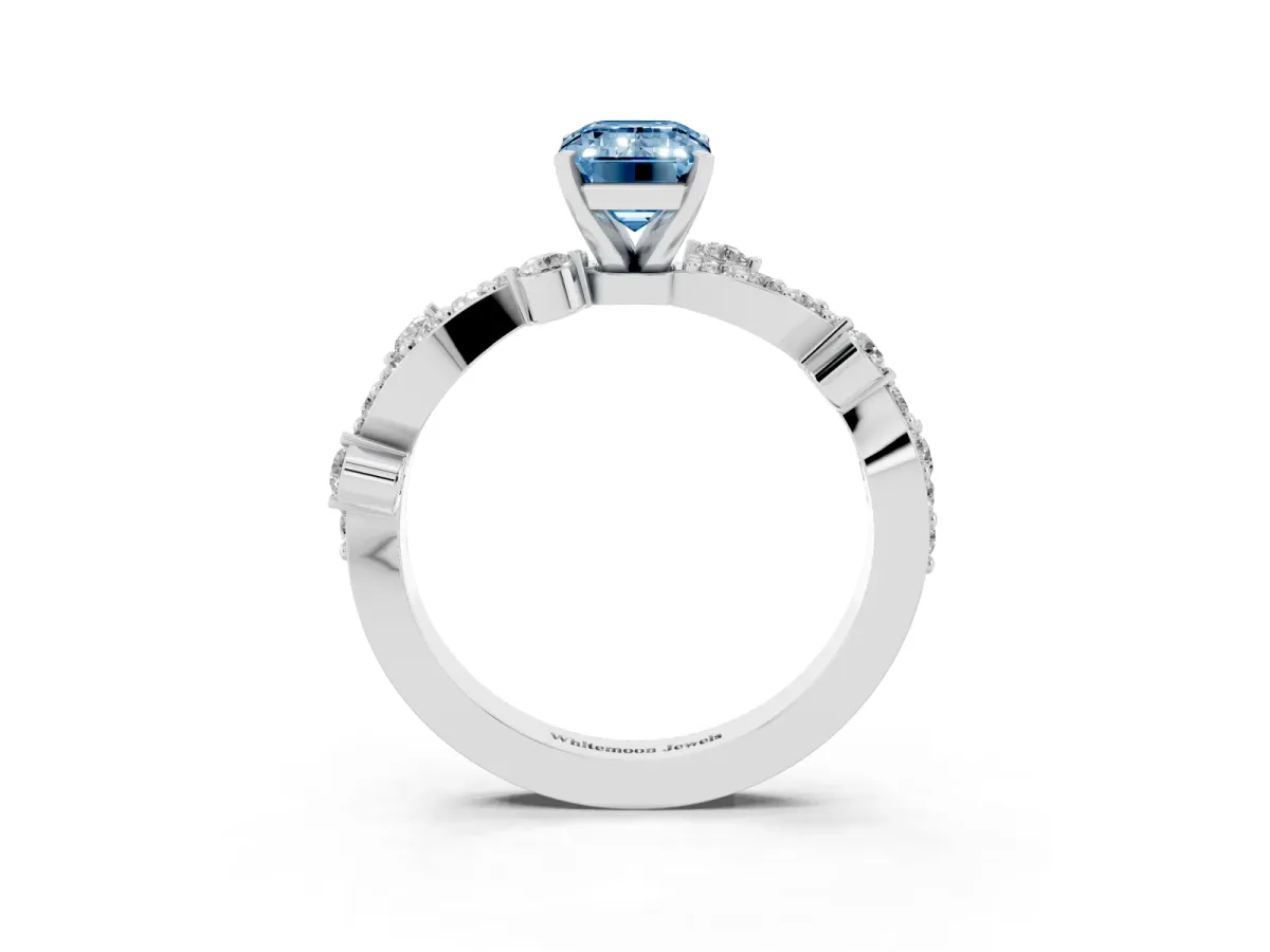 Fancy Blue Emerald Cut Cut Solitaire Diamond Twisted Band with Pave Setting White gold