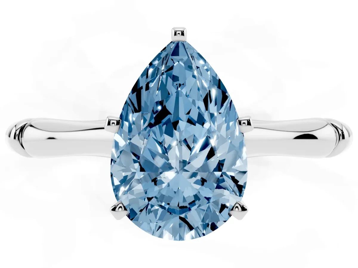 Fancy Blue Pear Cut Solitaire Diamond Ring with Bamboo Band and Four-Prong Setting Platinum