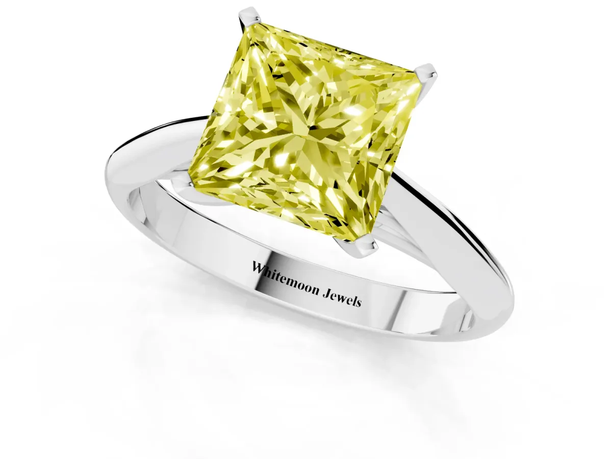 Fancy Yellow Princess Cut Diamond Solitaire Engagement Ring with Cathedral Setting and Four-Prong Mount Silver