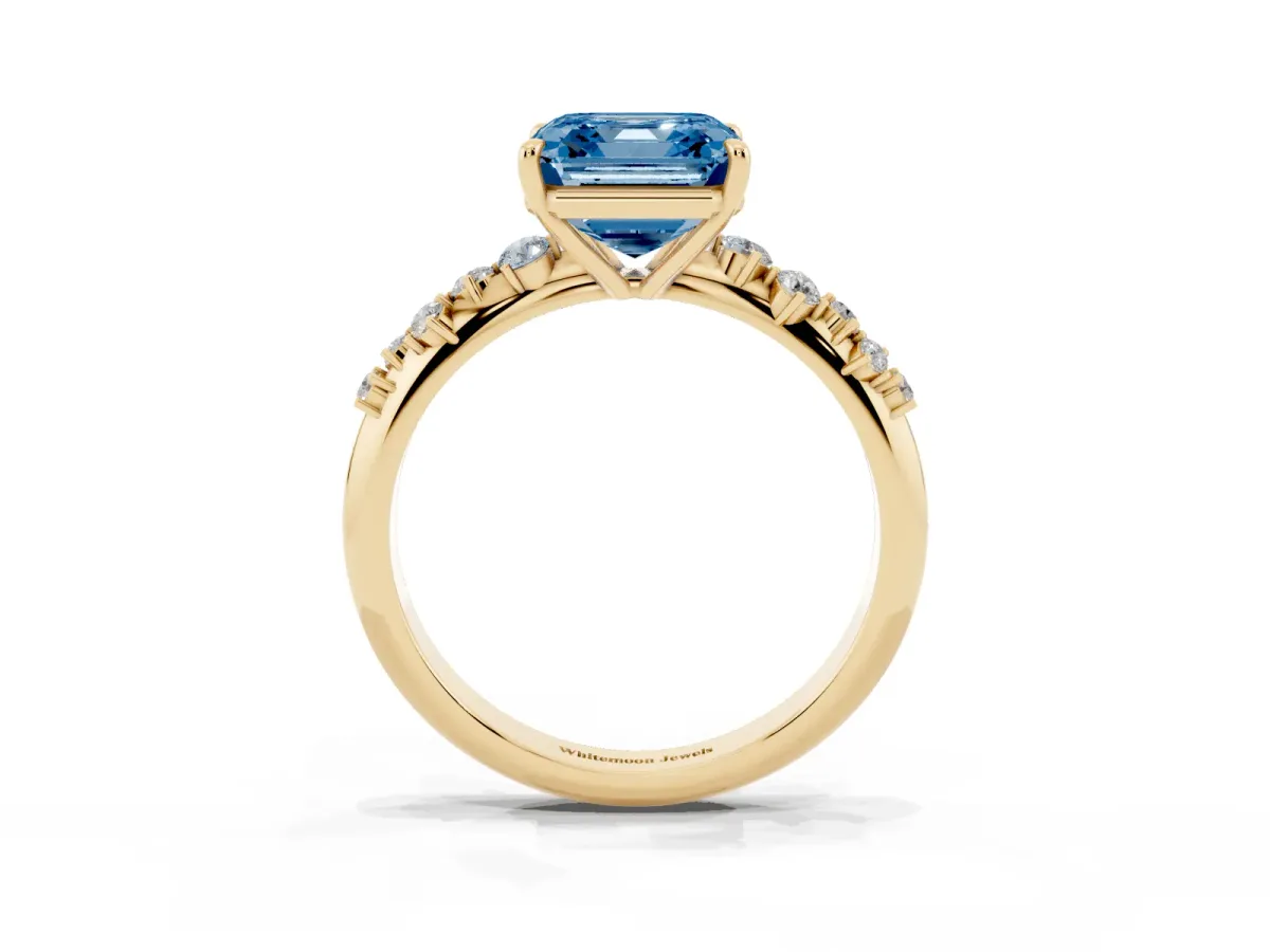 Fancy Blue Asscher Cut Diamond Cluster Side Stone Solitaire Ring with Prong Setting Yellow gold