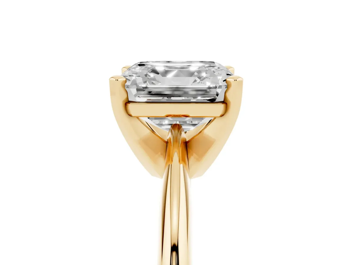 Asscher Cut Cut Solitaire Ring with Four-Prong Setting on a Classic Band Yellow gold
